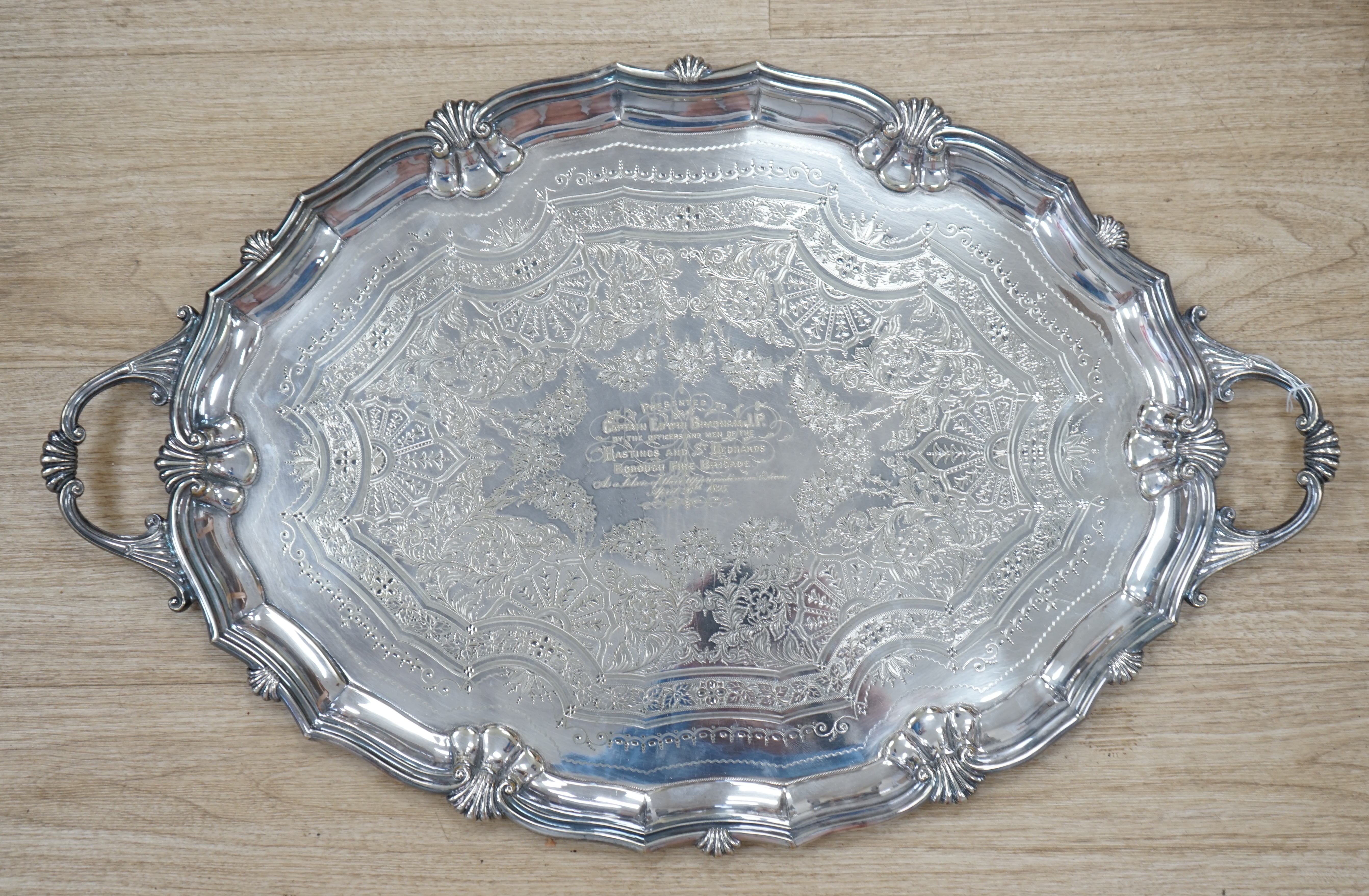 A large late Victorian plated two handled presentation tea tray, 71cm. Condition - fair